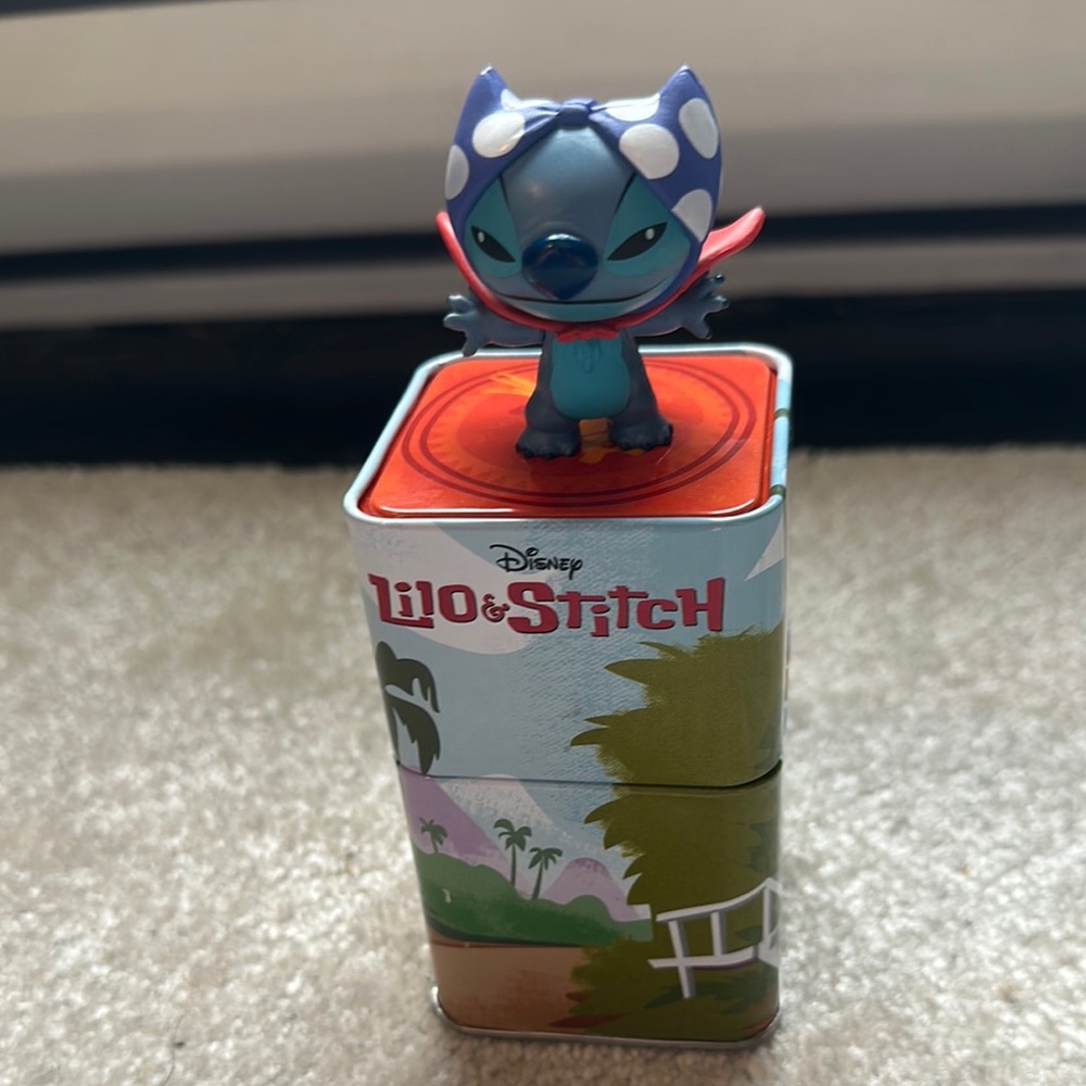 Hot Topic Exclusive Disney Lilo & Stitch Figure with Red Cape and Tin